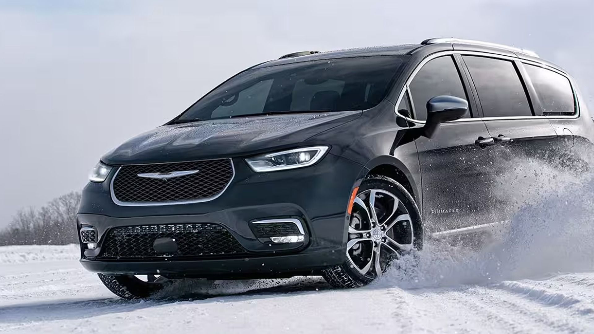 3/4 front view of the 2024 Chrysler Pacifica Hybrid in snow