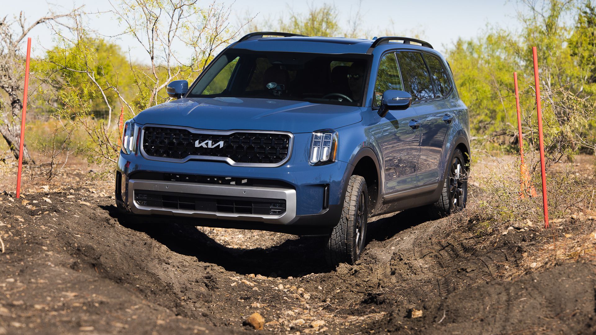 2024 Kia Telluride front action shot driving off-road