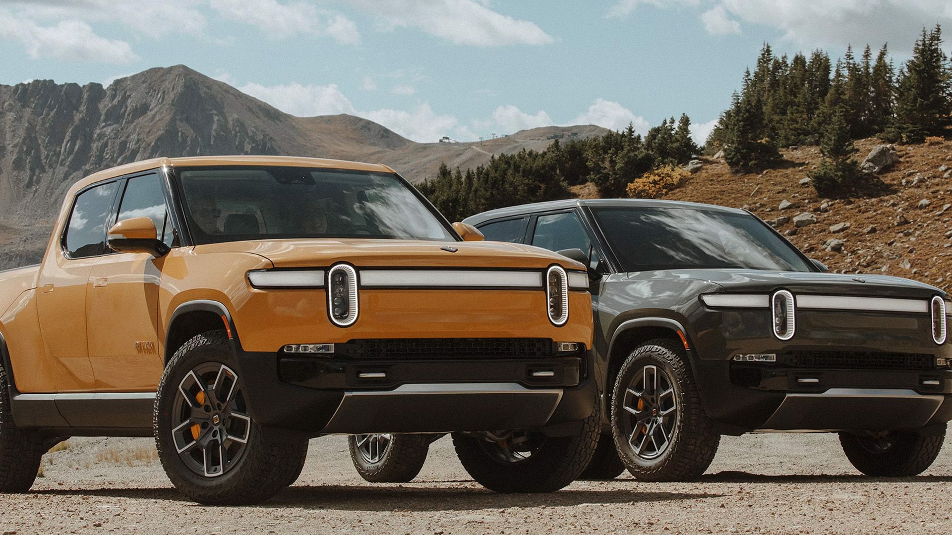 A Yellow and Black 2024 Rivian R1T 