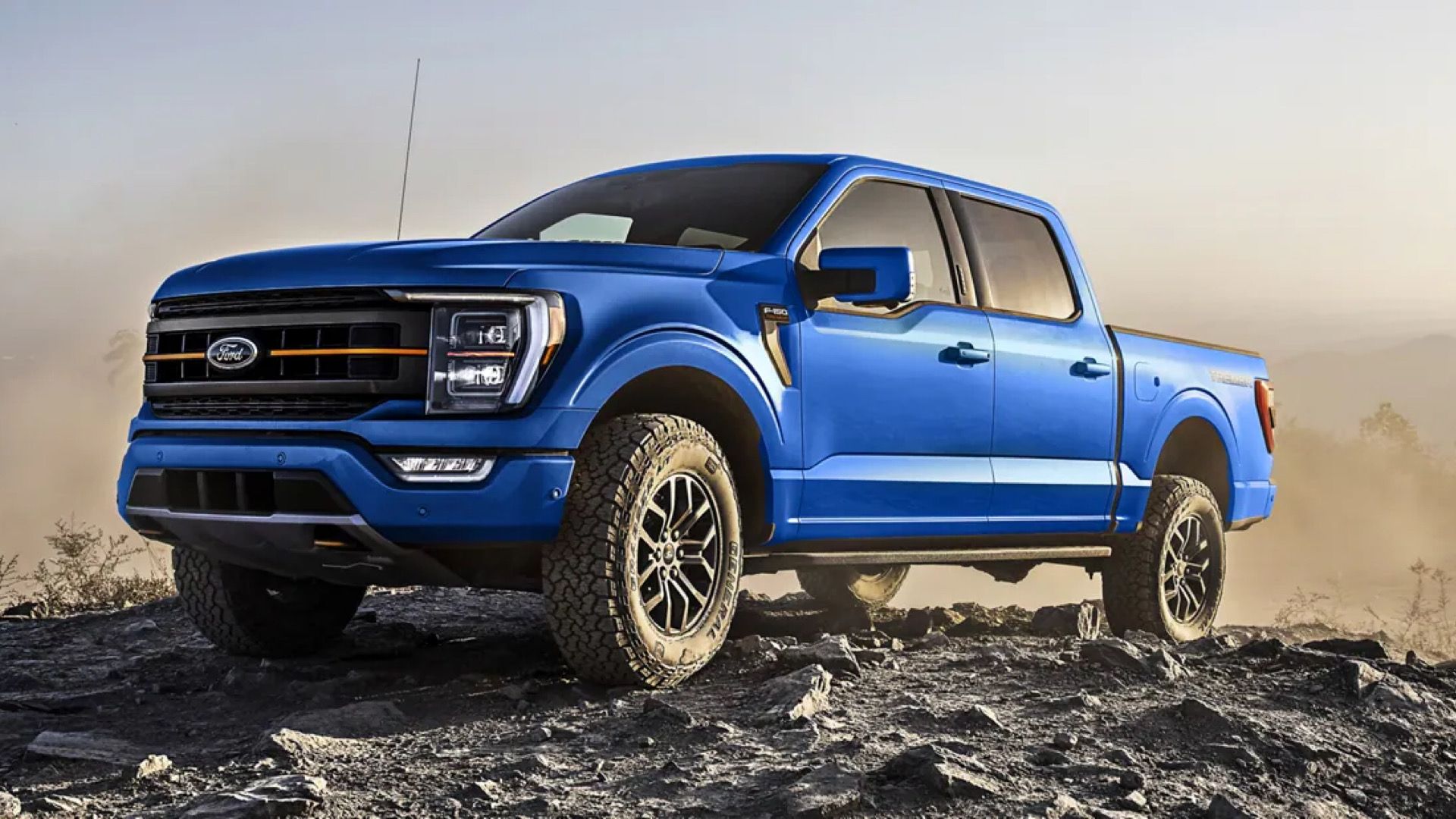 2023 Ford F-150 in blue Posing on top of rocky terrain