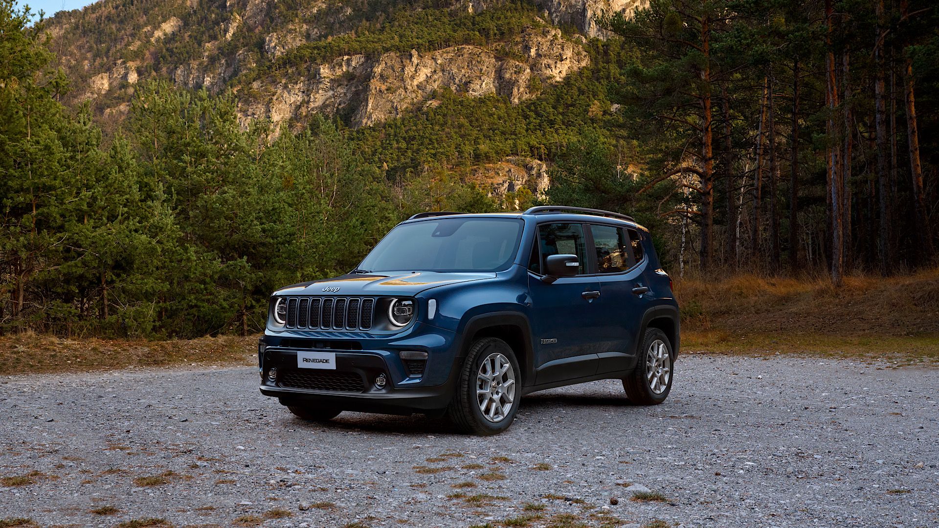2024 Jeep Renegade M24 in blue Posing in forest clearing
