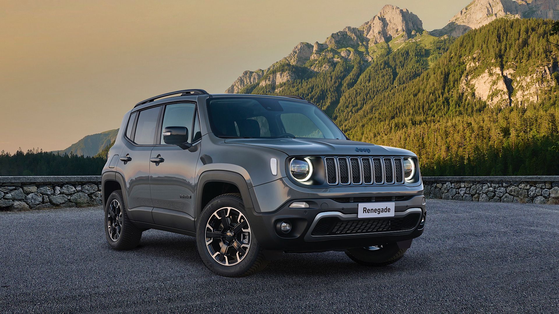 2024 Jeep Renegade Upland in silver Posing on gravel road 