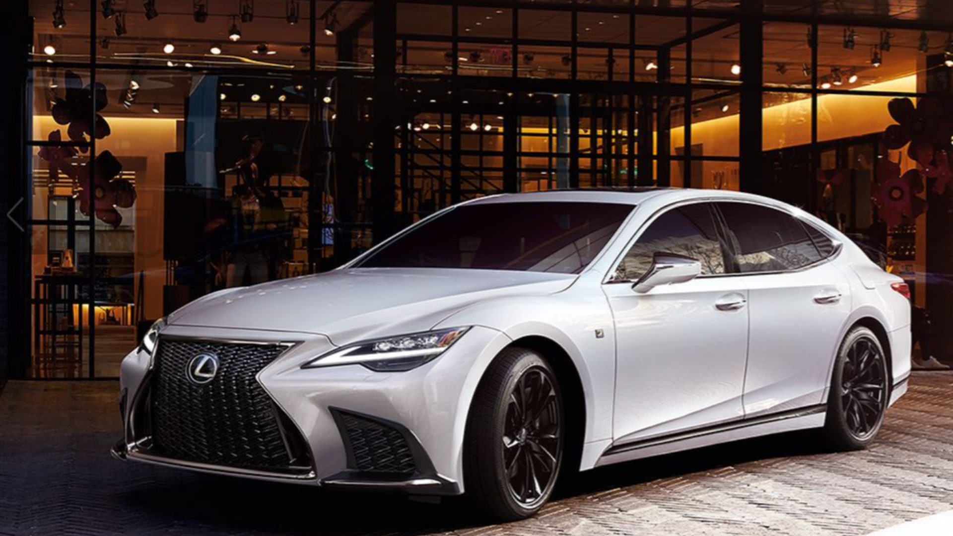 Front three-quarters shot of a white Lexus LS 