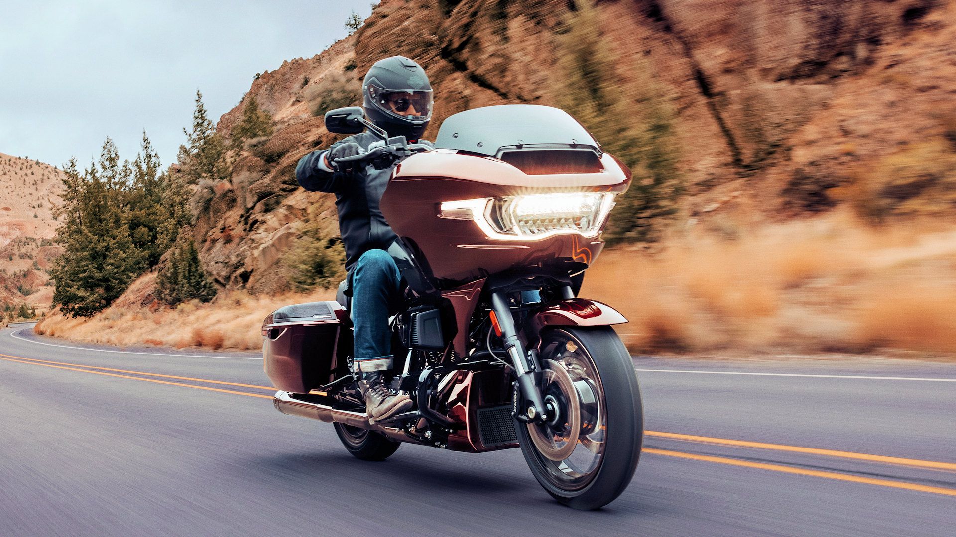 Rider cruising on a 2024 Harley-Davidson CVO Road Glide