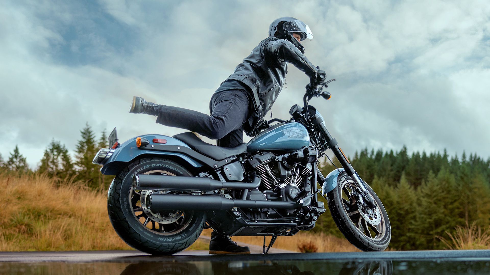 Rider mounting a 2024 Harley-Davidson Low Rider S