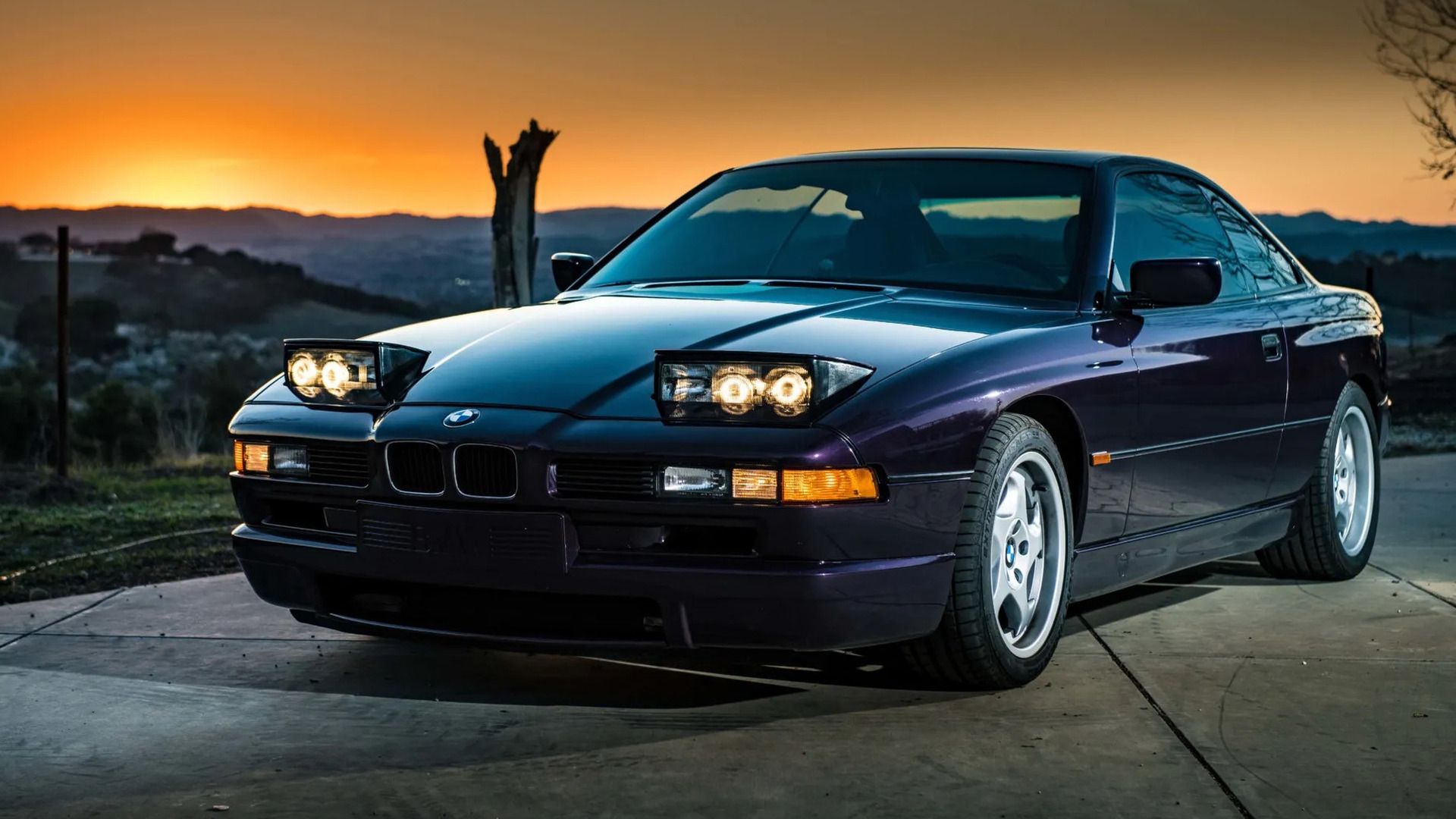Purple 1995 BMW 850 CSi With Lights Open Parked Front 3/4 View