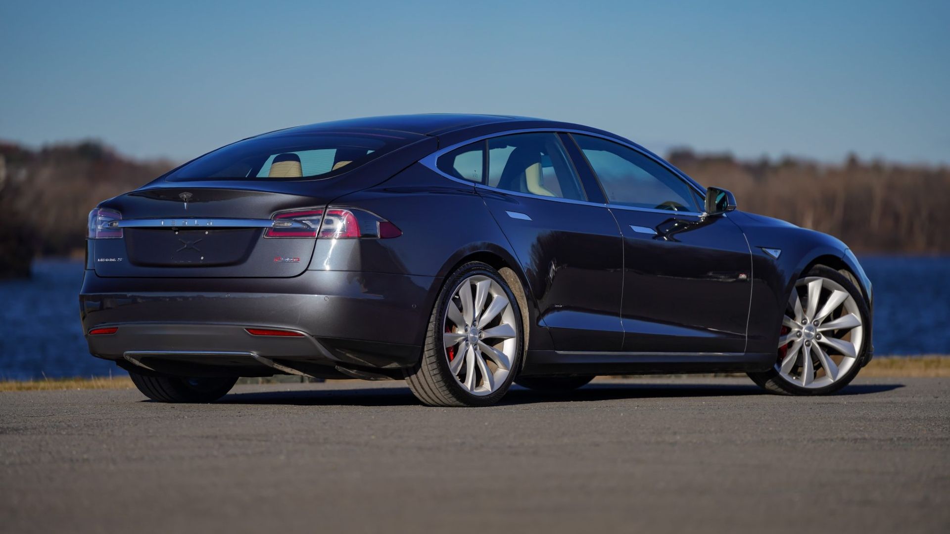 Rear three quarters shot of a parked 2015 Tesla Model S