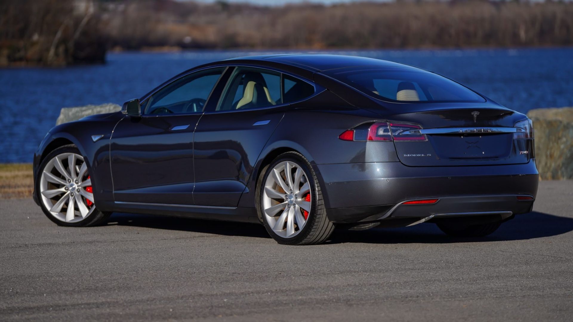Rear three quarters shot of a parked 2015 Tesla Model S117-scaled-1