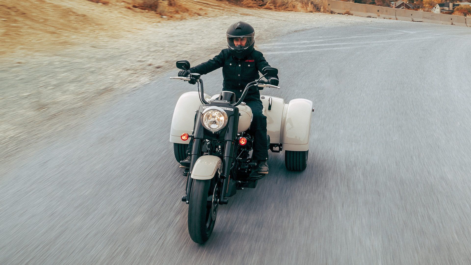 2023 Harley-Davidson Freewheeler cruising through the countryside