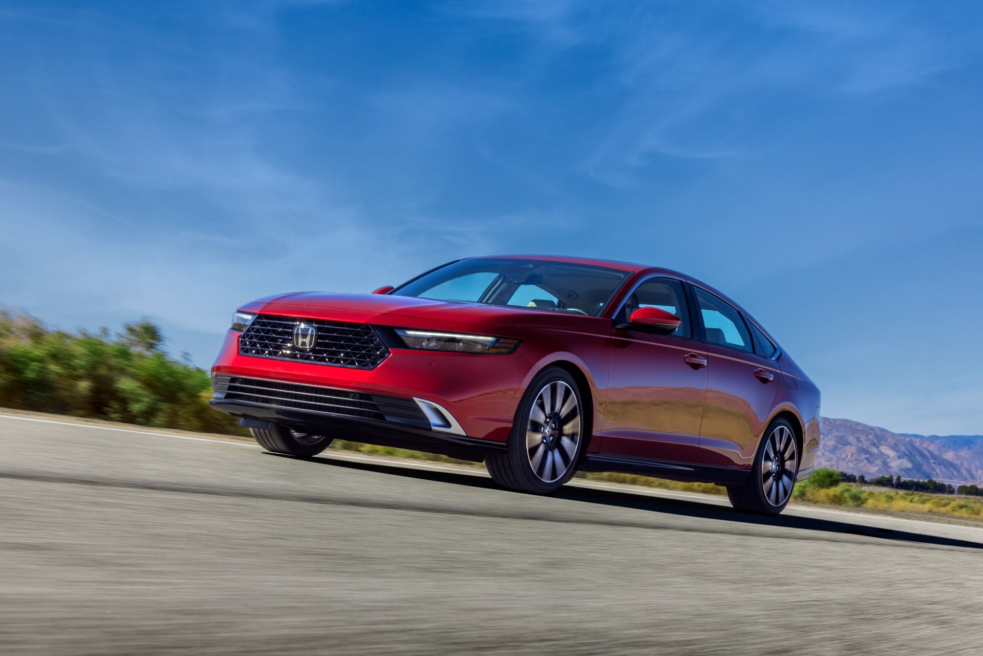 Radiant Red 2023 Honda Accord Hybrid Front 3/4 view 