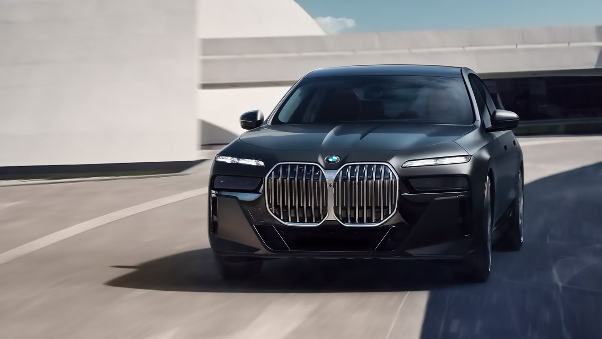 A Black 2024 BMW 7 Series Driving