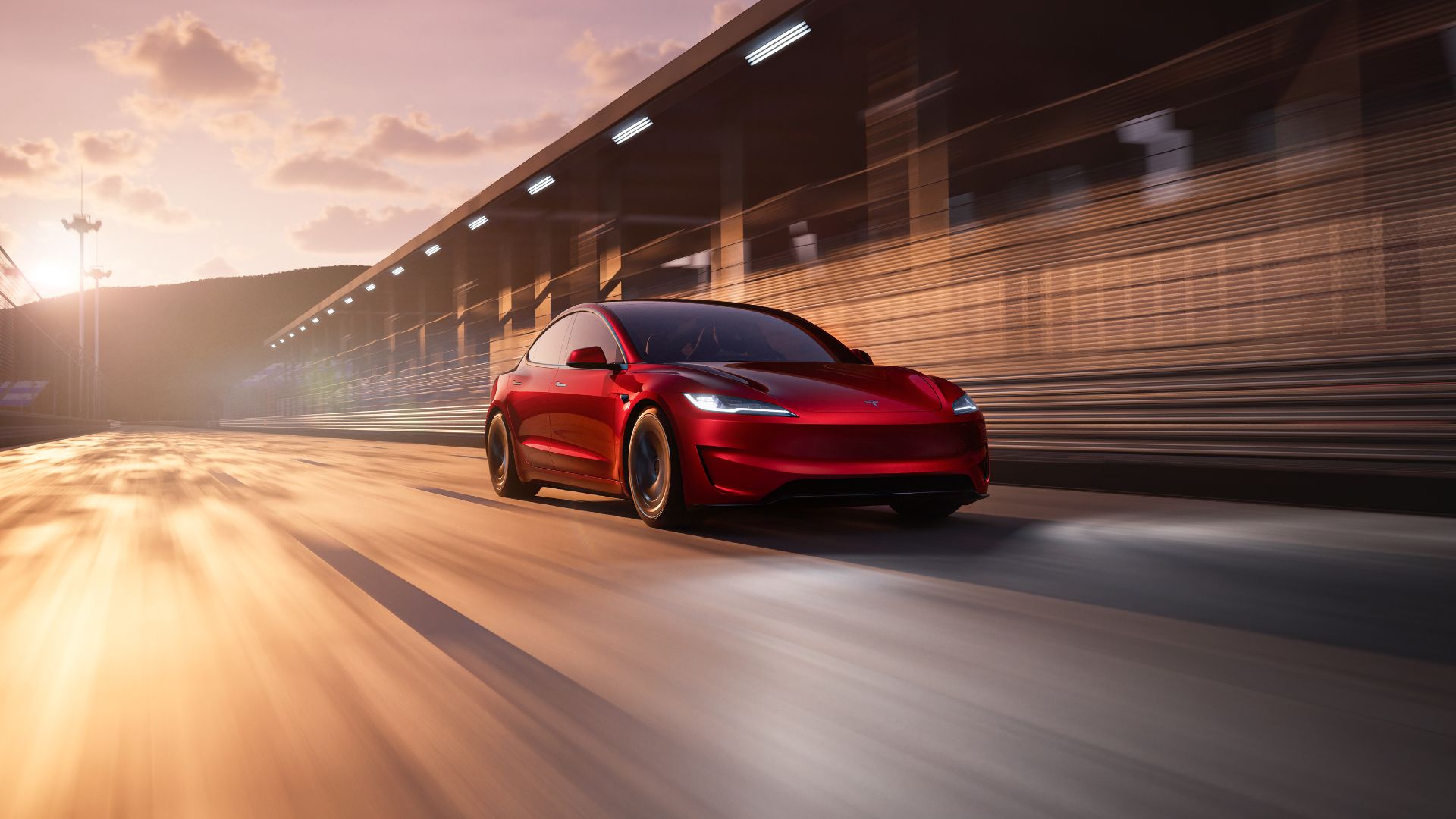Red 2024 Tesla Model 3 Performance Driving