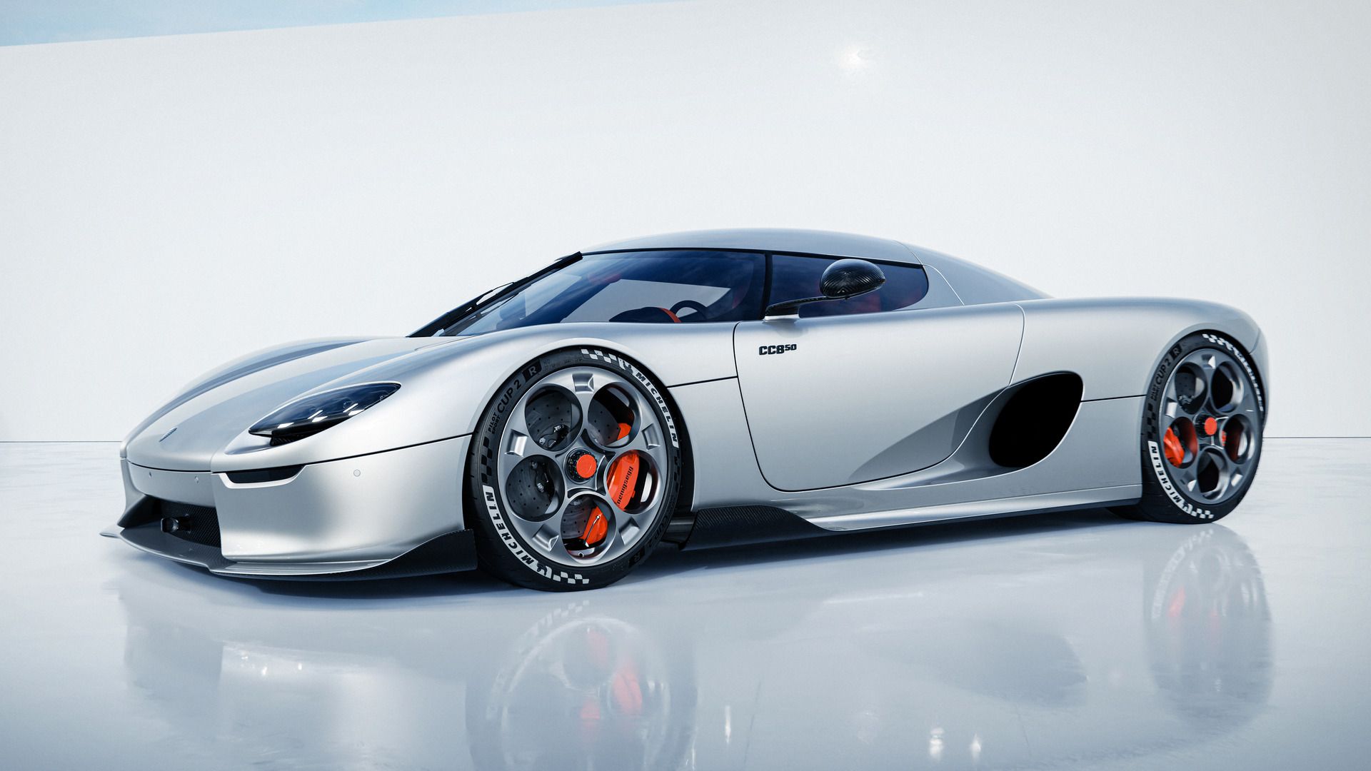 Silver Koenigsegg CC850 Parked In Studio Front 3/4 View