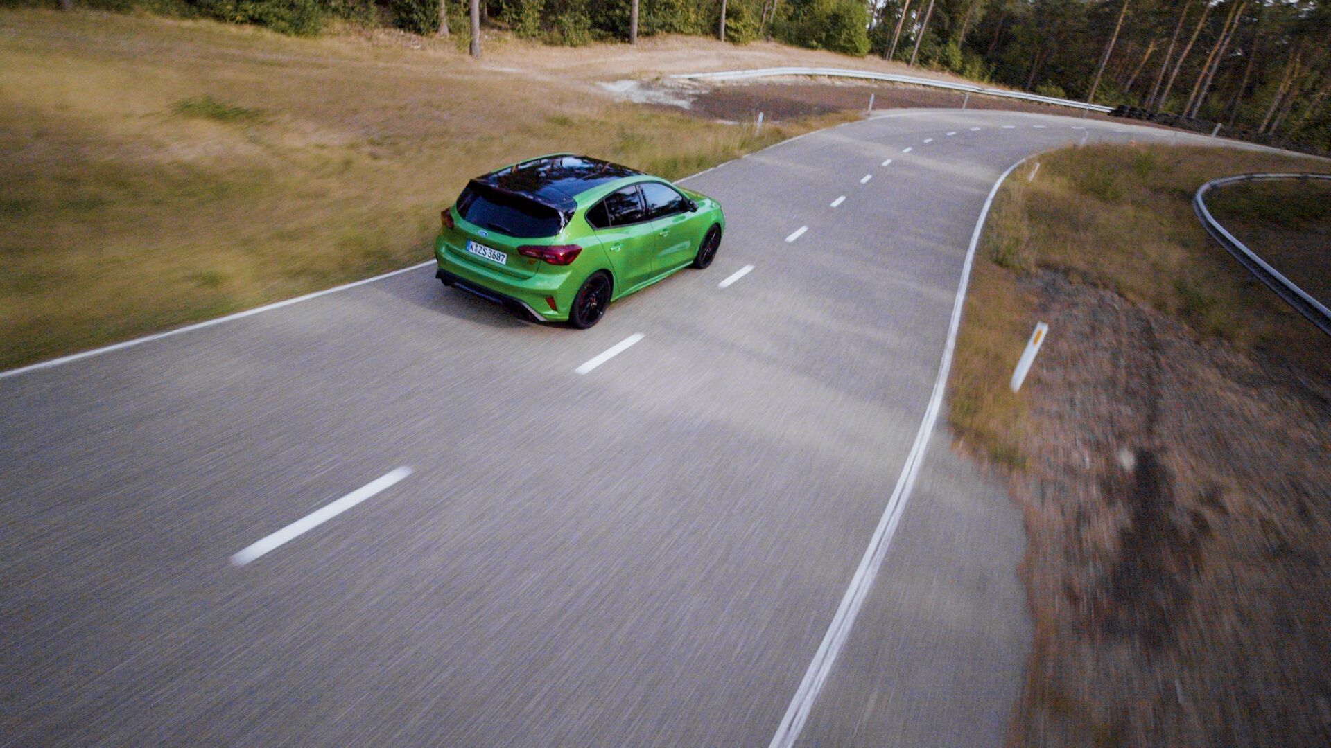 Green Ford Focus ST Track Pack driving away