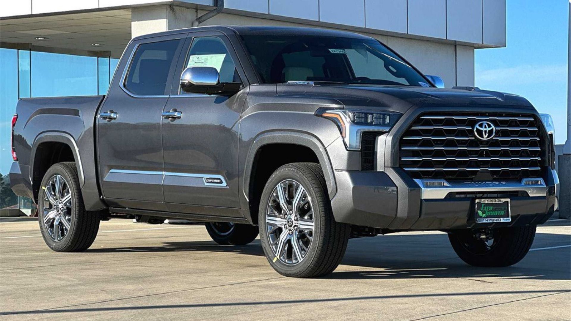 2024 Toyota Tundra Capstone in gray Posing in front of showroom 