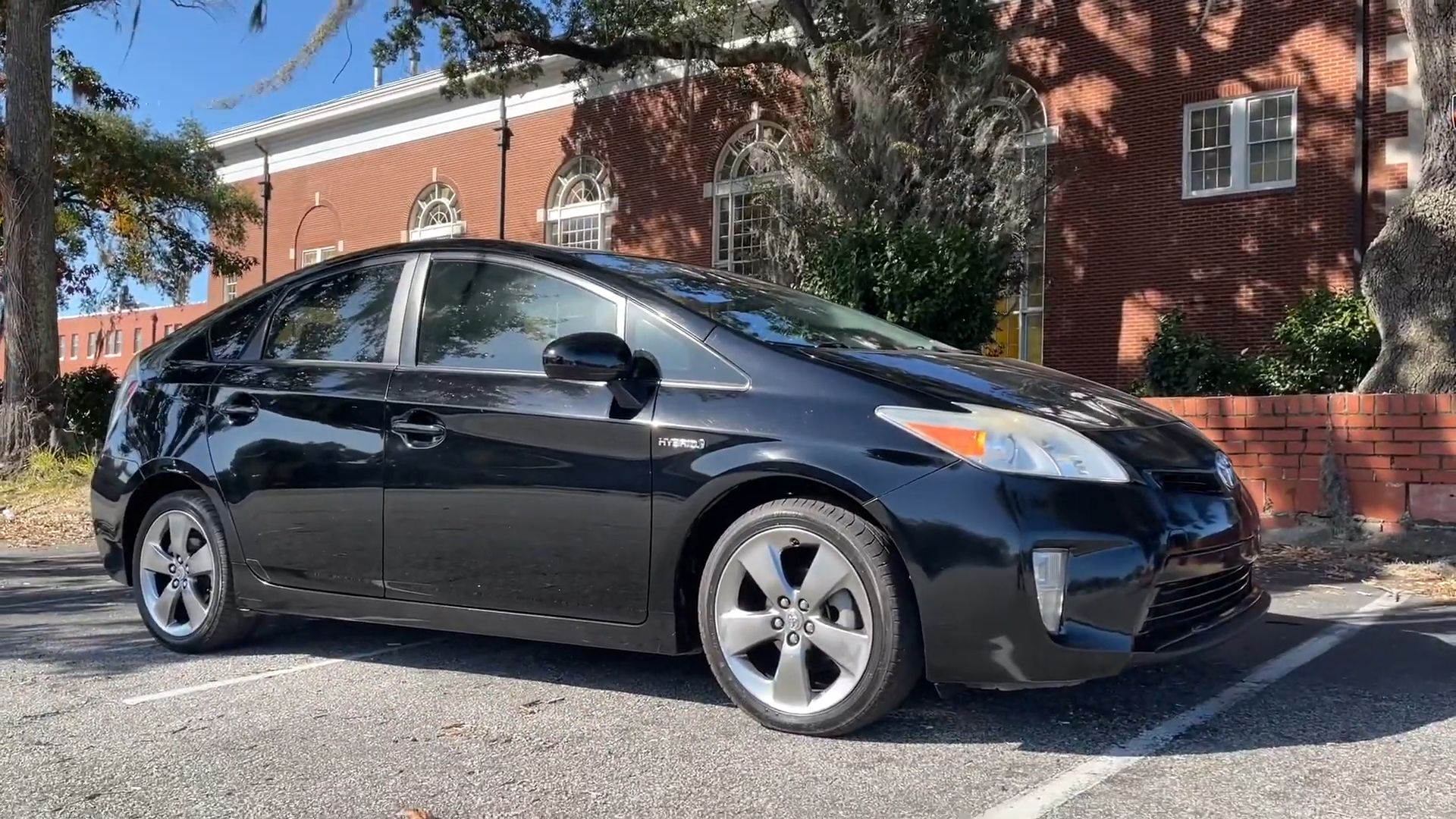 Black 2013 Toyota Prius Persona parked