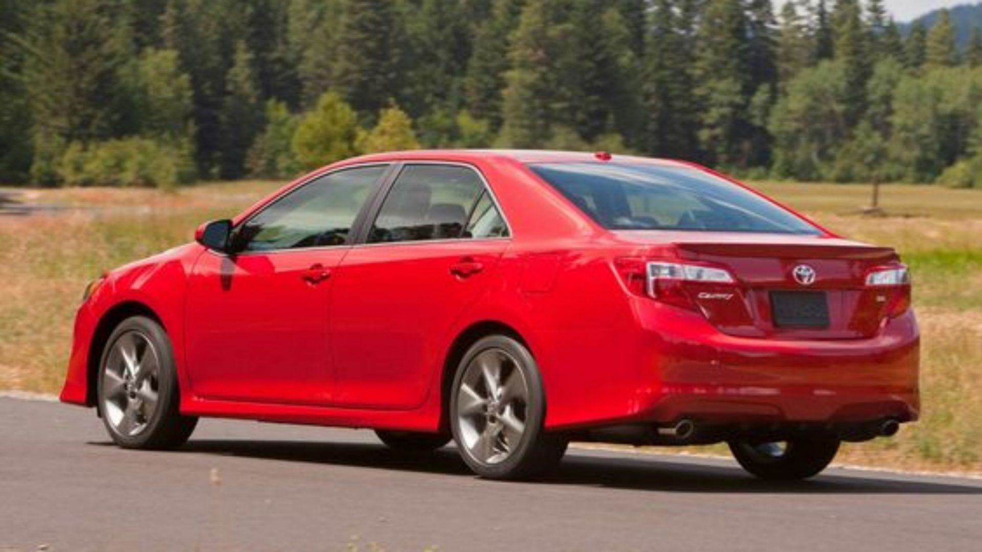 Rear 3/4 shot of a 2014 Toyota Camry