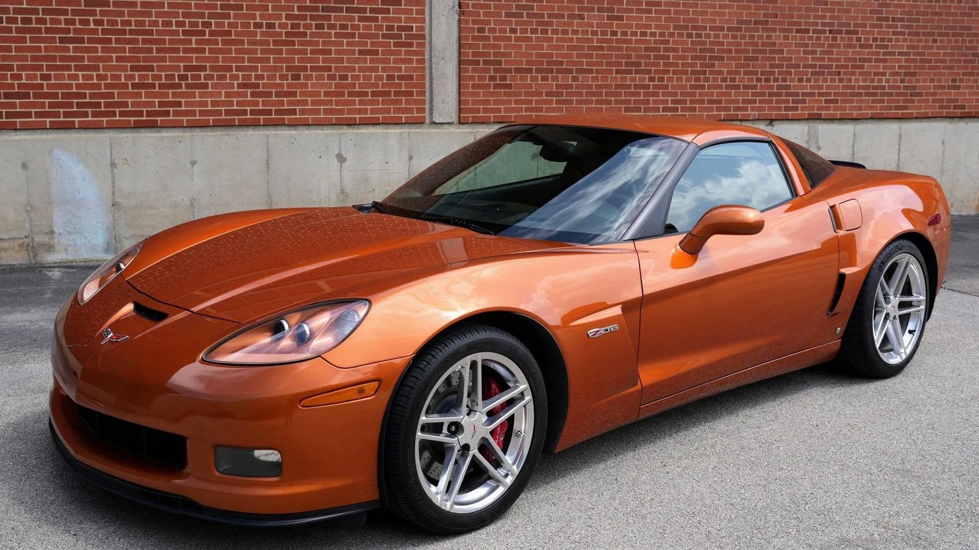 A front 3/4 shot of an orange 2007 Chevrolet Corvette Z06.