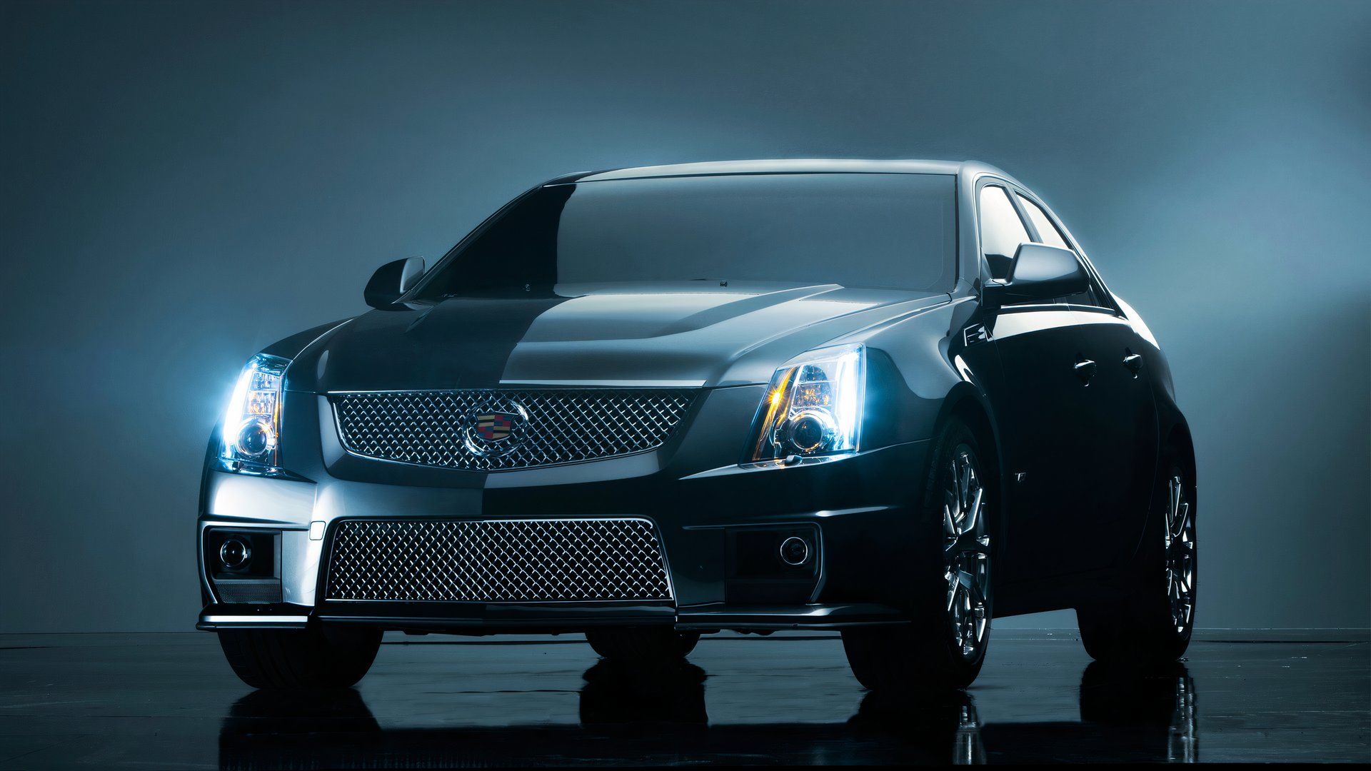 2012 Cadillac CTS-V Sedan Parked With Lights On Front 3/4 View