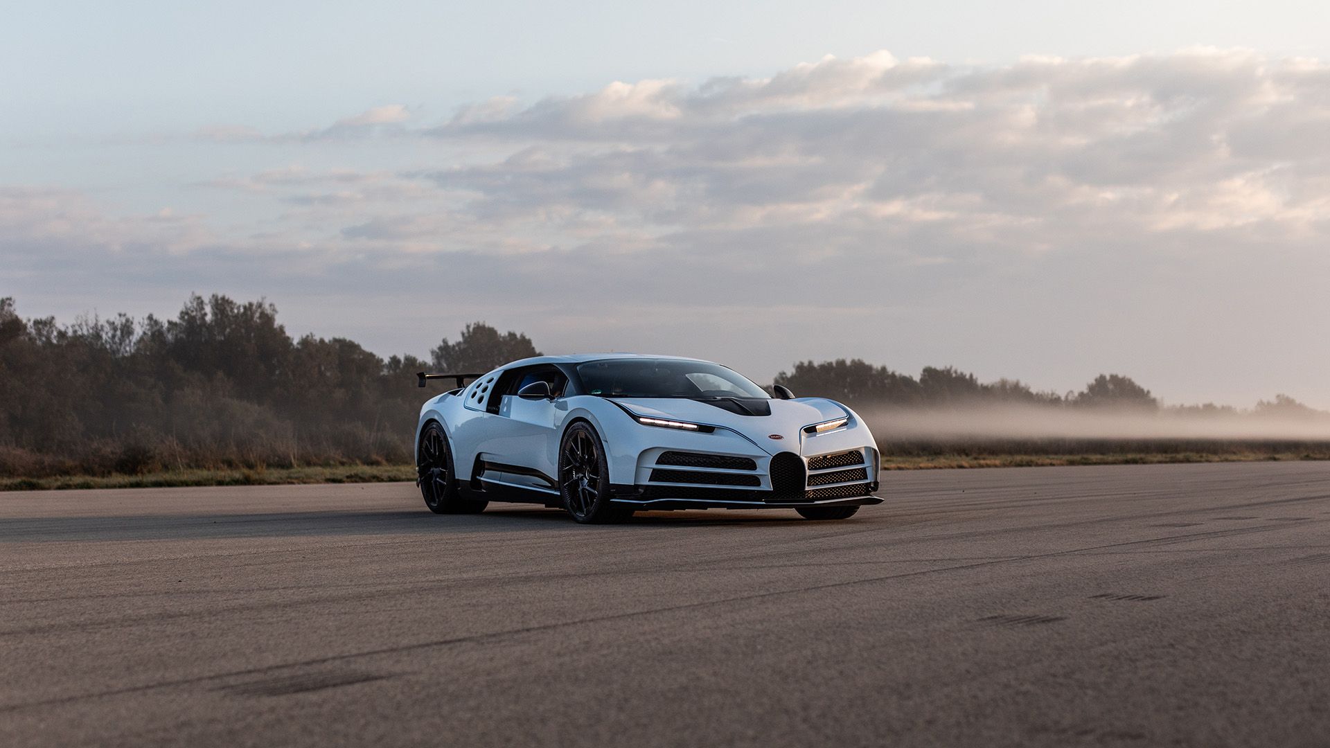 A 3/4 front end shot of a White 2022 Bugatti Centodieci Parked