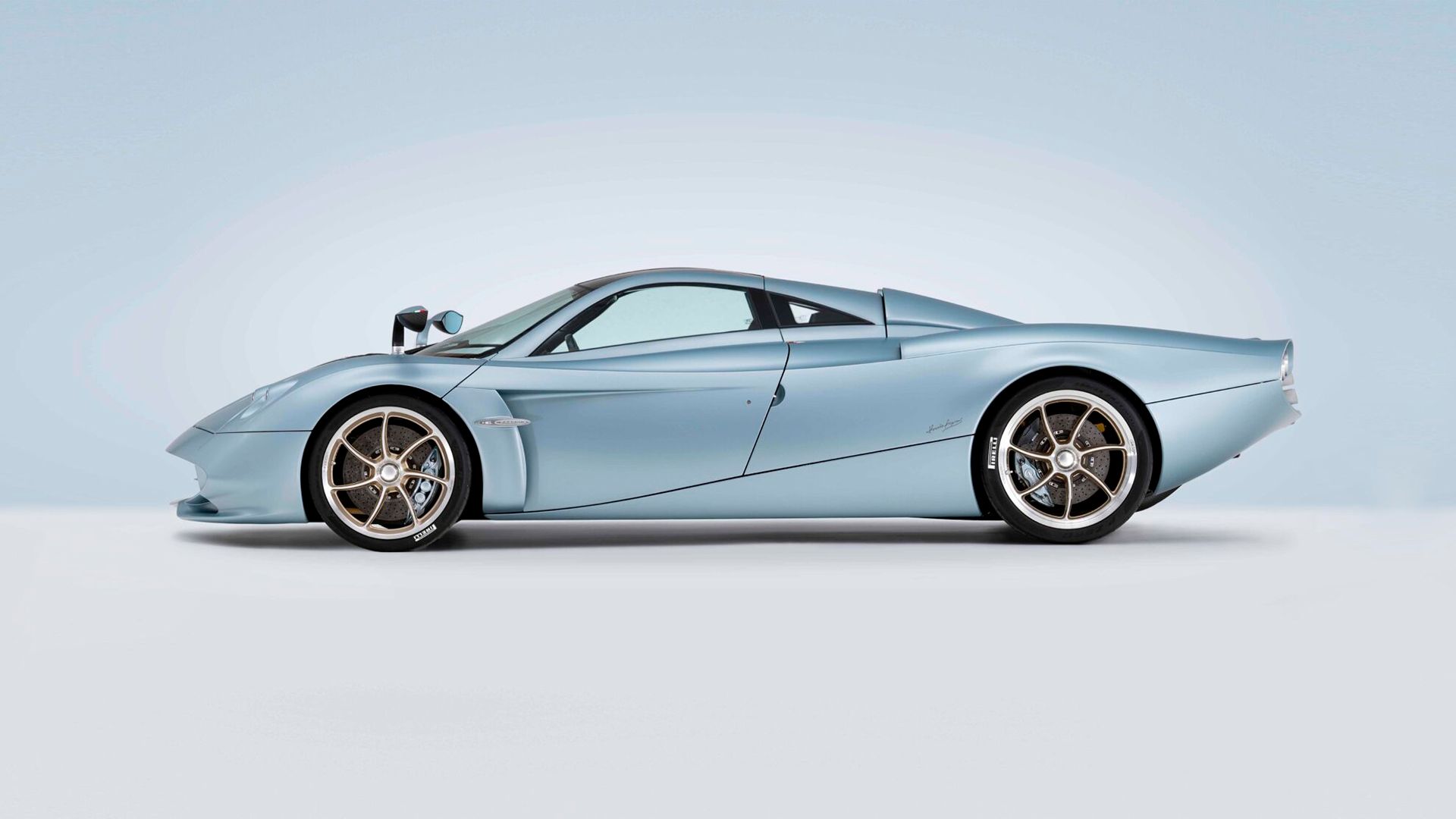 A side view of The Blue 2022 Pagani Huayra Codalunga