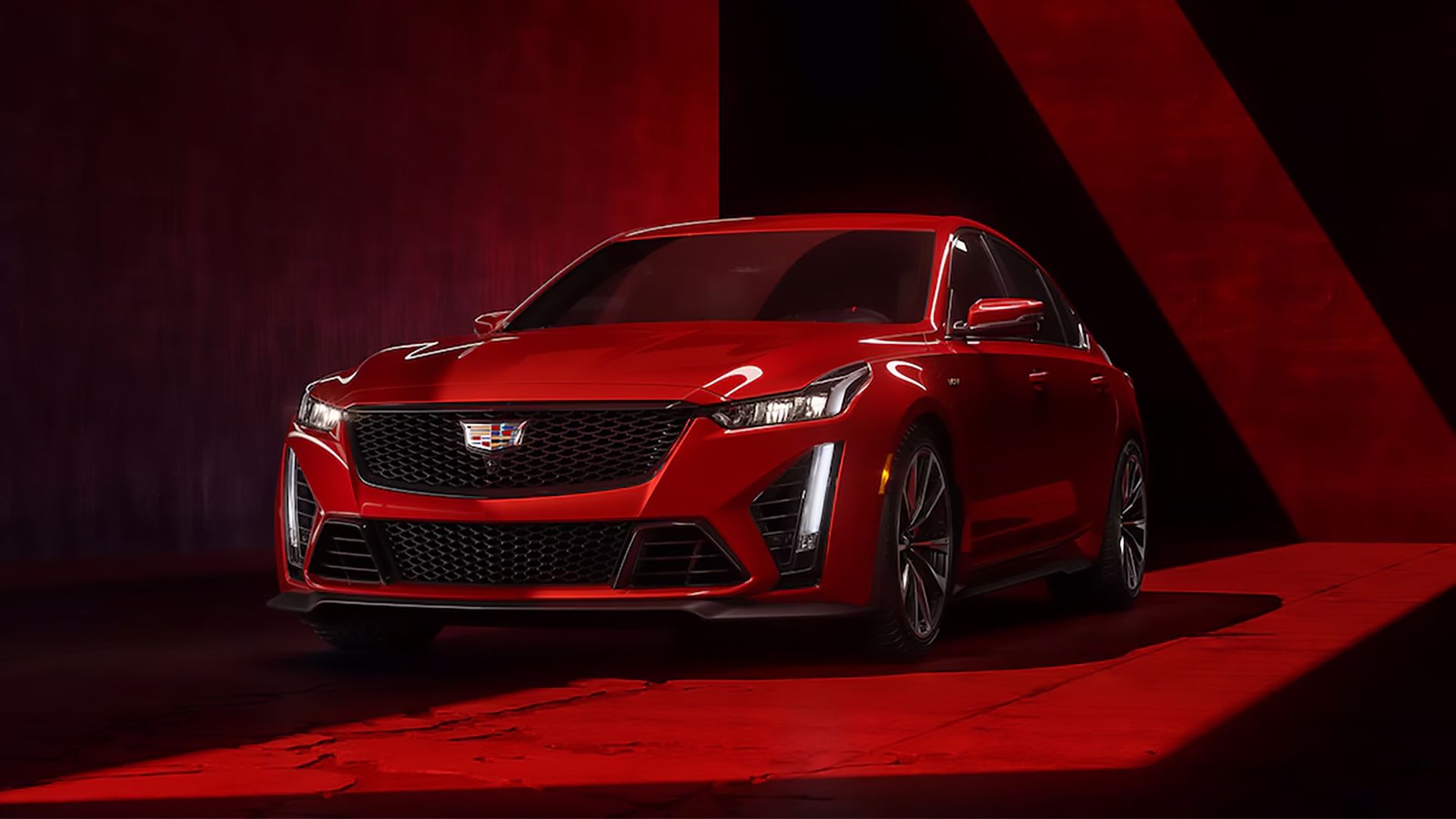 A Red 2024 Cadillac CT5-V Blackwing posing in studio