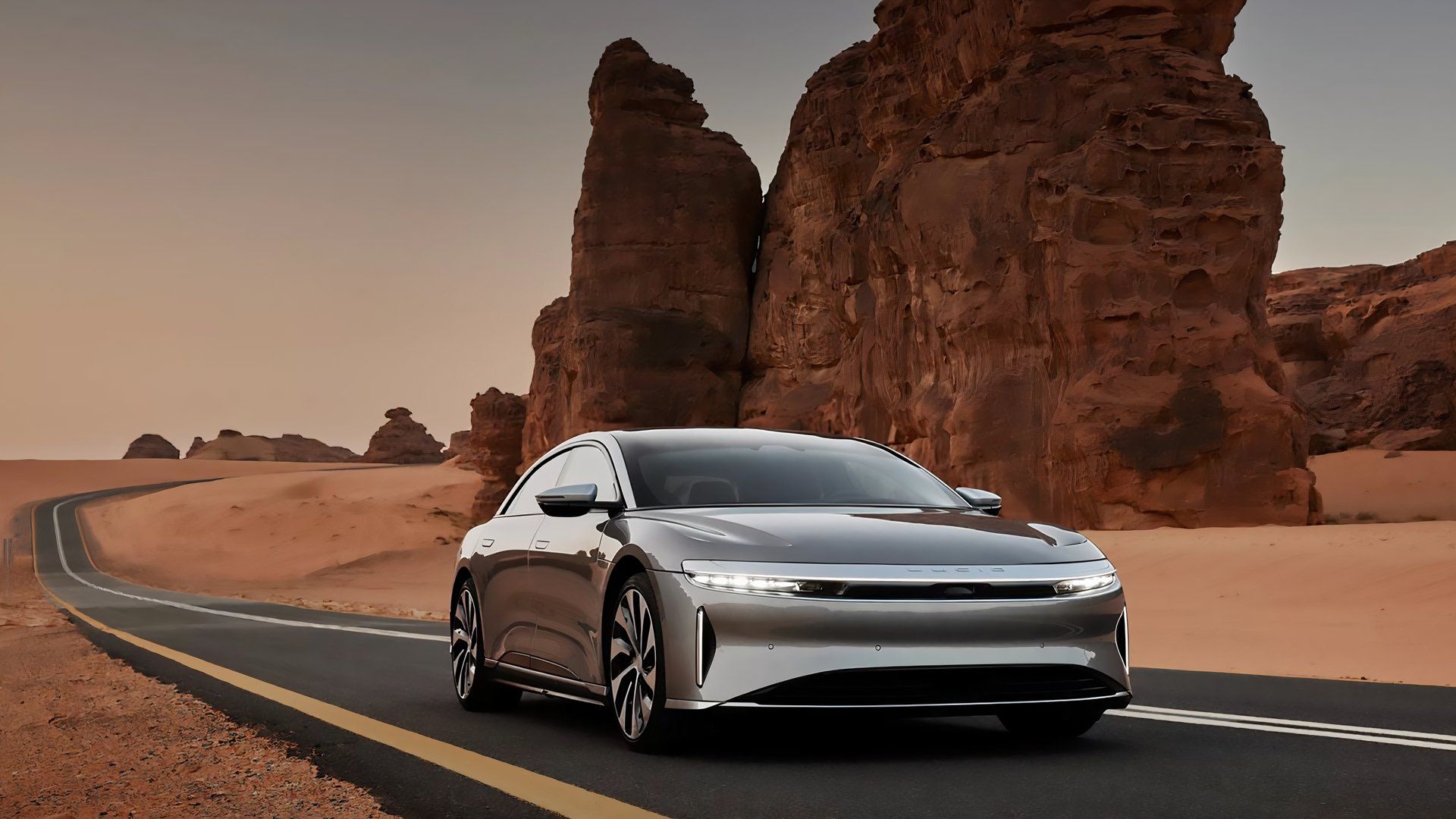 A Silver 2024 Lucid Air Grand Touring Driving