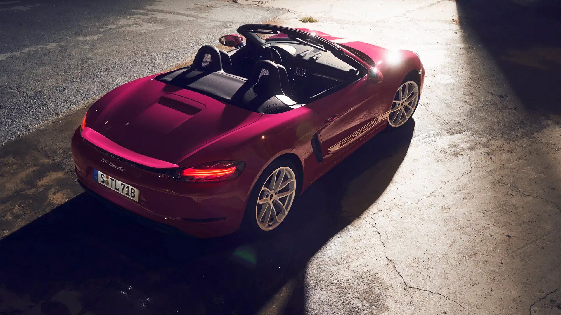 A Pink 2024 Porsche 718 Boxster Parked