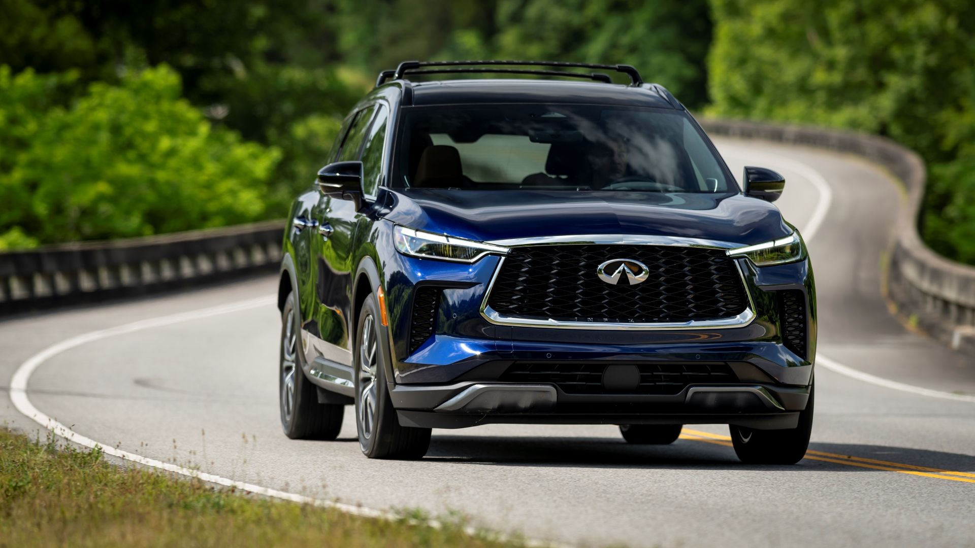 Front action shot of a 2024 Infiniti QX60