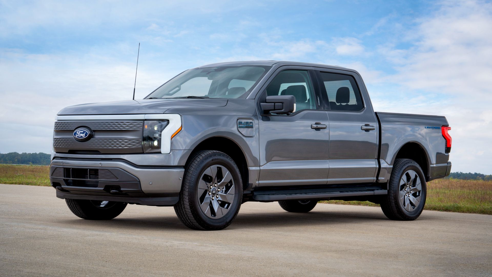 Front three-quarters shot of a silver F-150 Lightning Flash