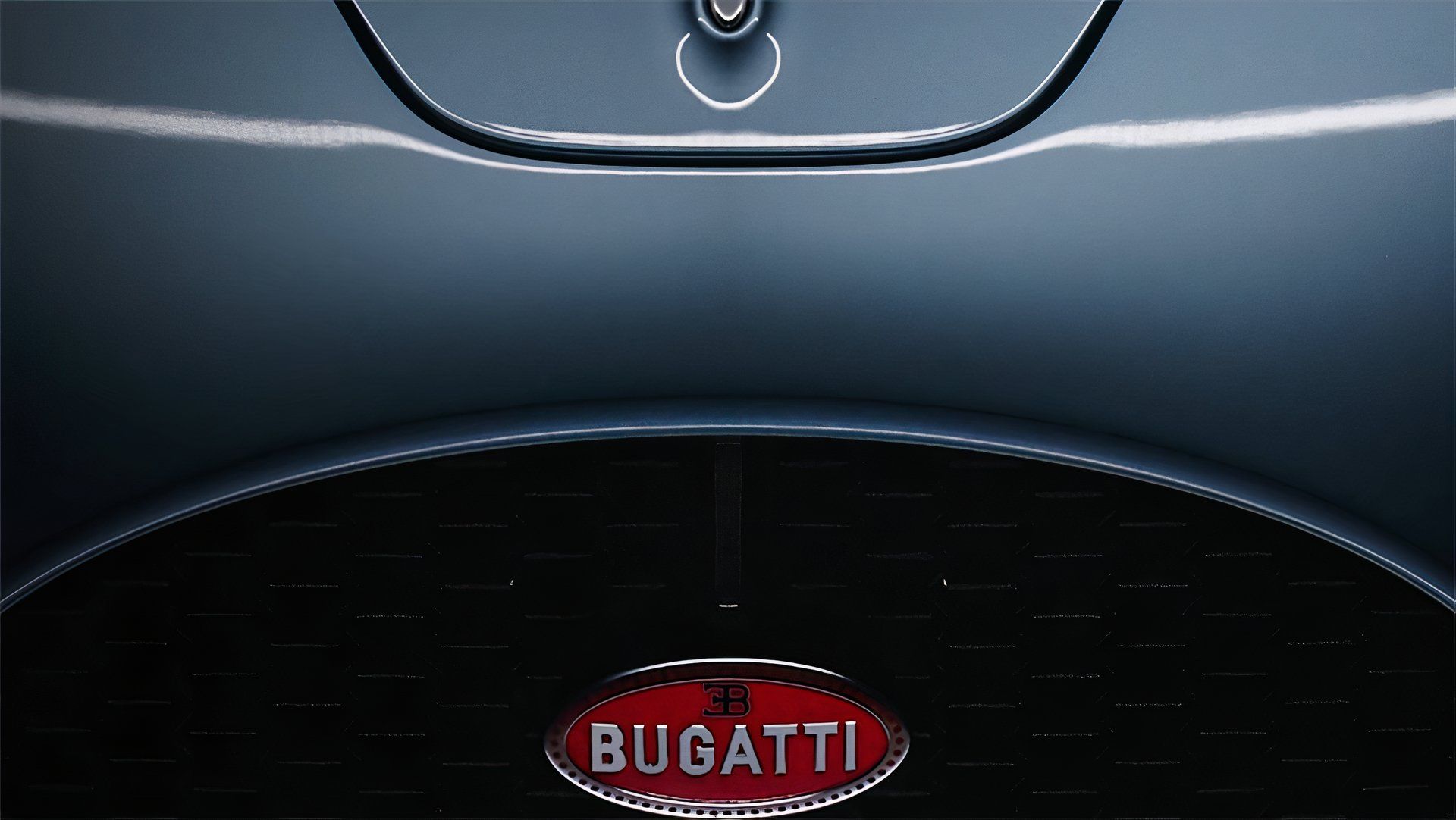 Close-up teaser shot of the Bugatti's new hyper sports car.