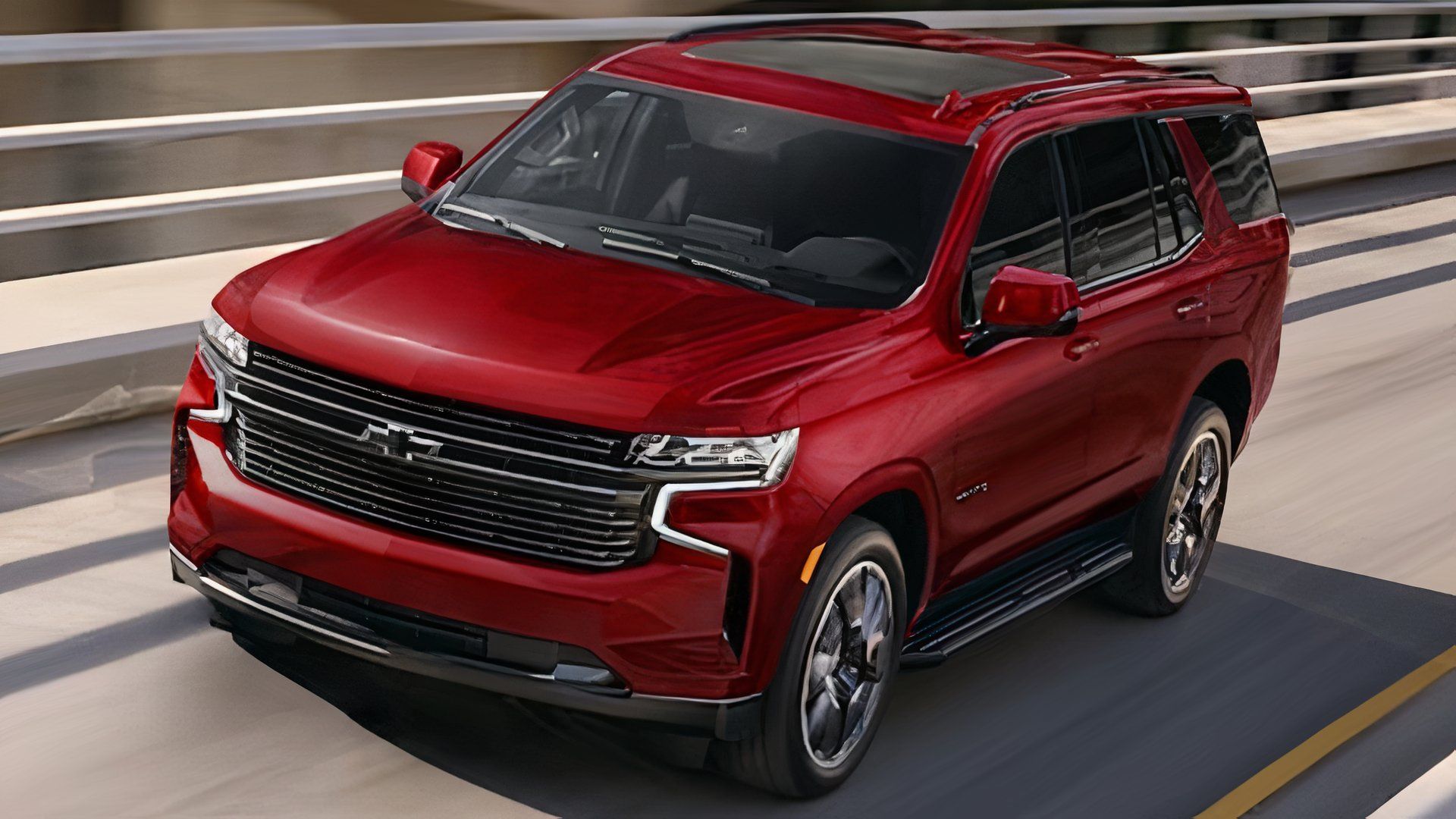 Vista frontal 3/4 do Chevrolet Tahoe vermelho 2024