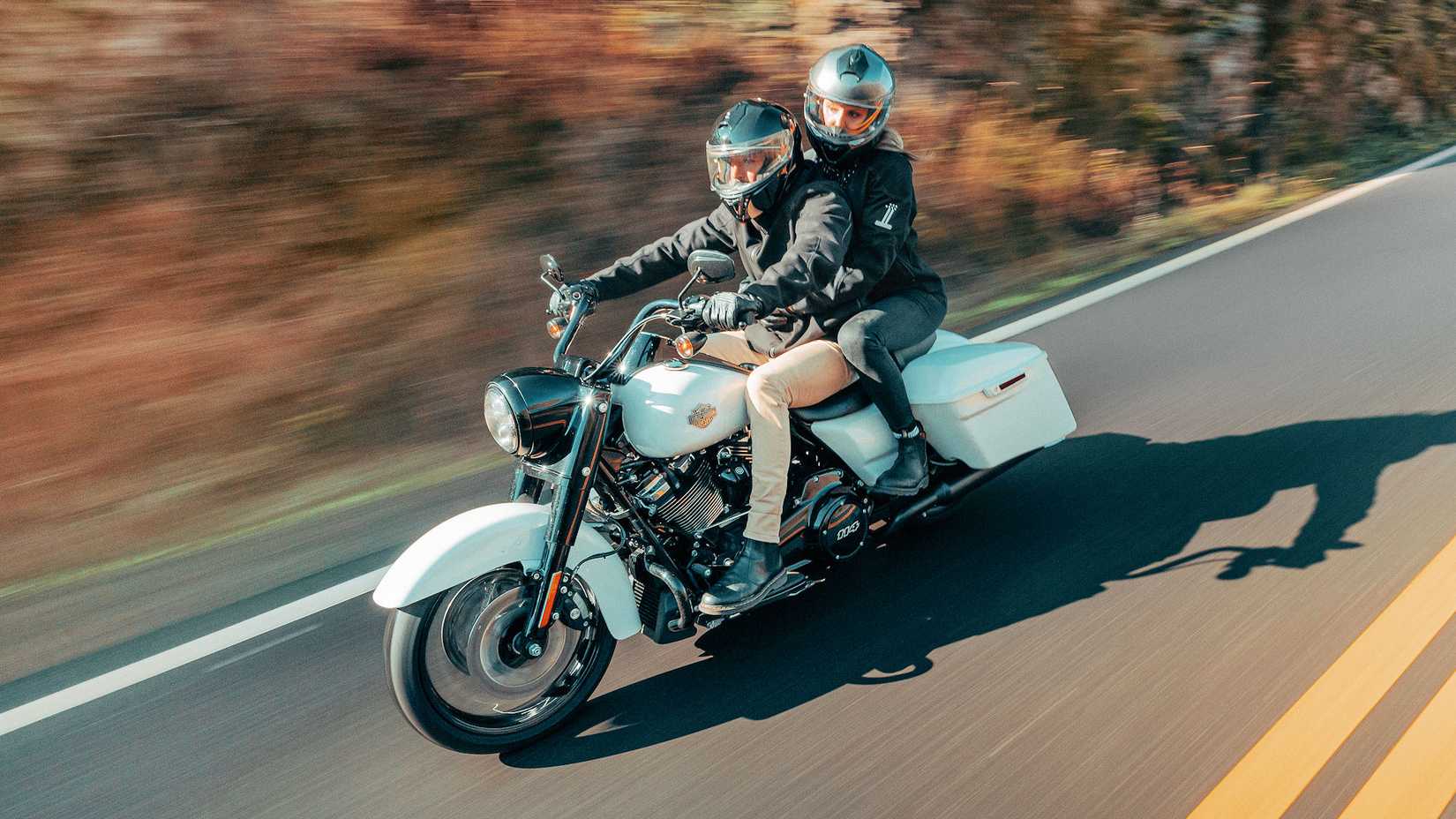 Rider and passenger on a 2024 Harley-Davidson Road King Special