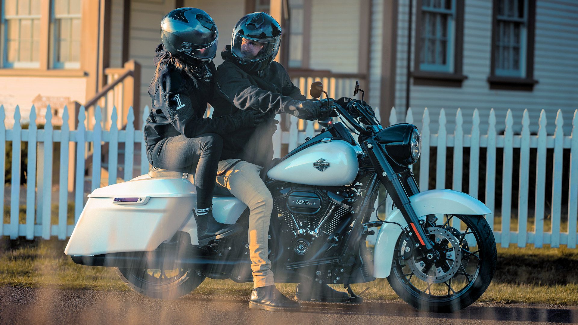 Rider and passenger sitting on a 2024 Harley-Davidson Road King Special