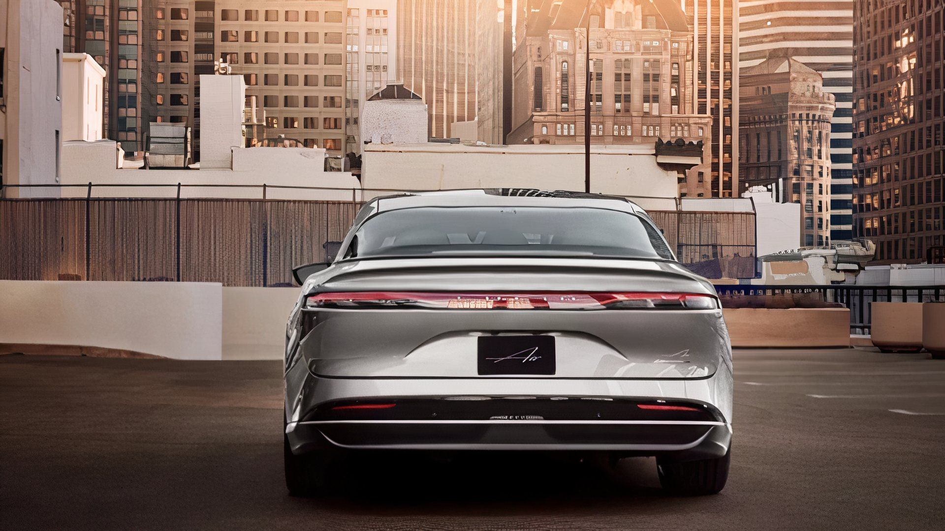 The rear of a gray 2025 Lucid Air.