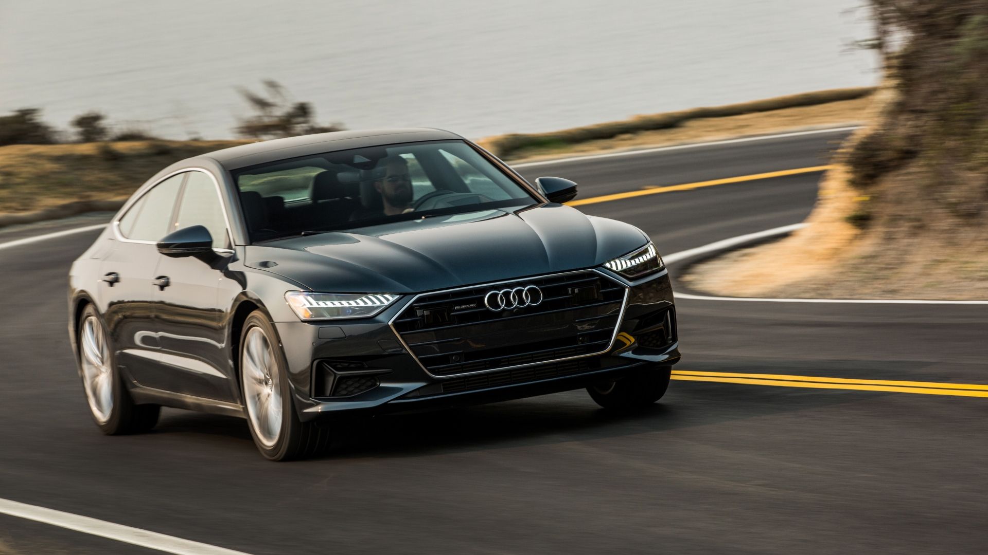 Front 3/4 action shot of a 2021 Audi A7