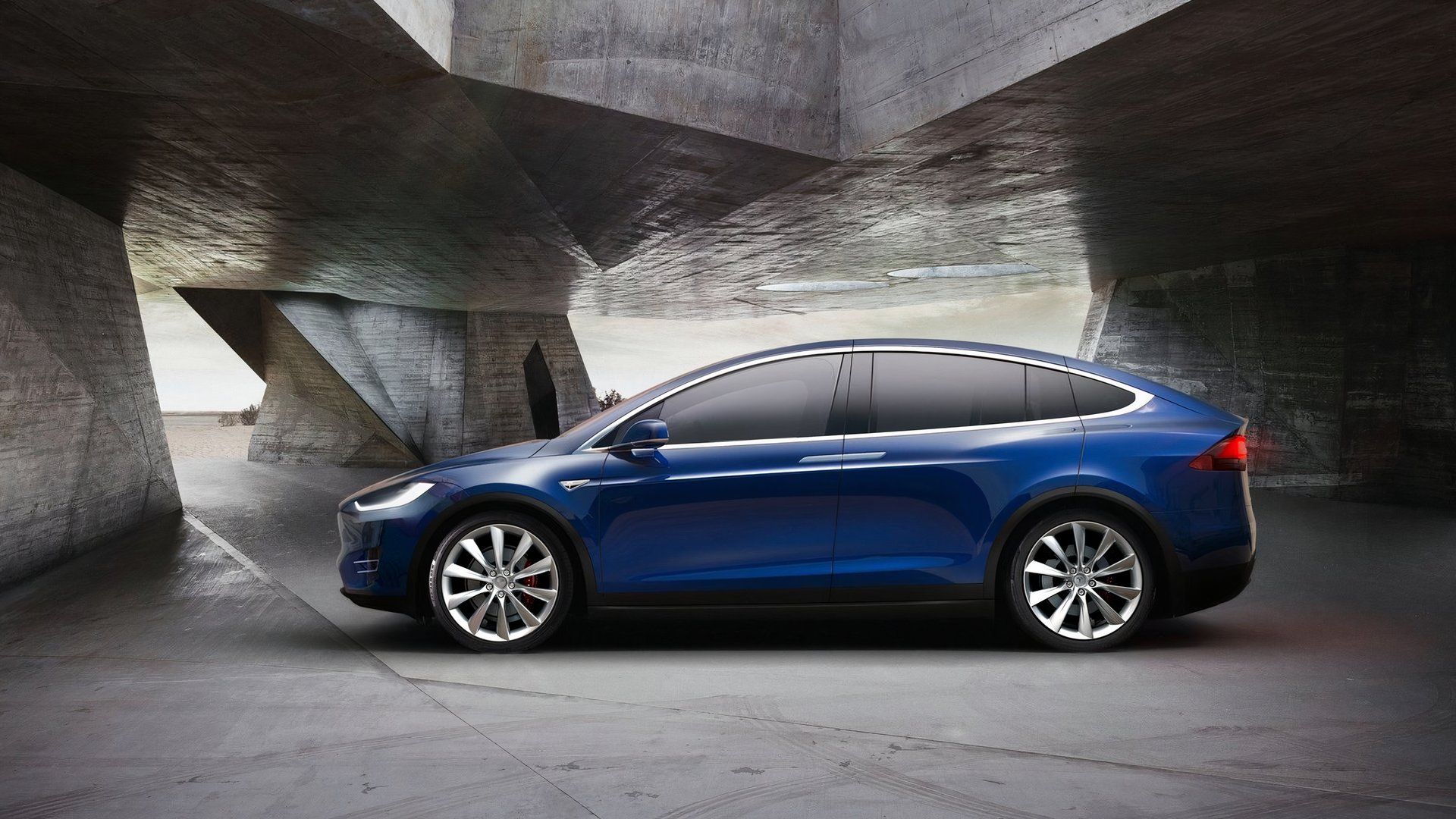 Foto de perfil lateral de um Tesla Model X 2019