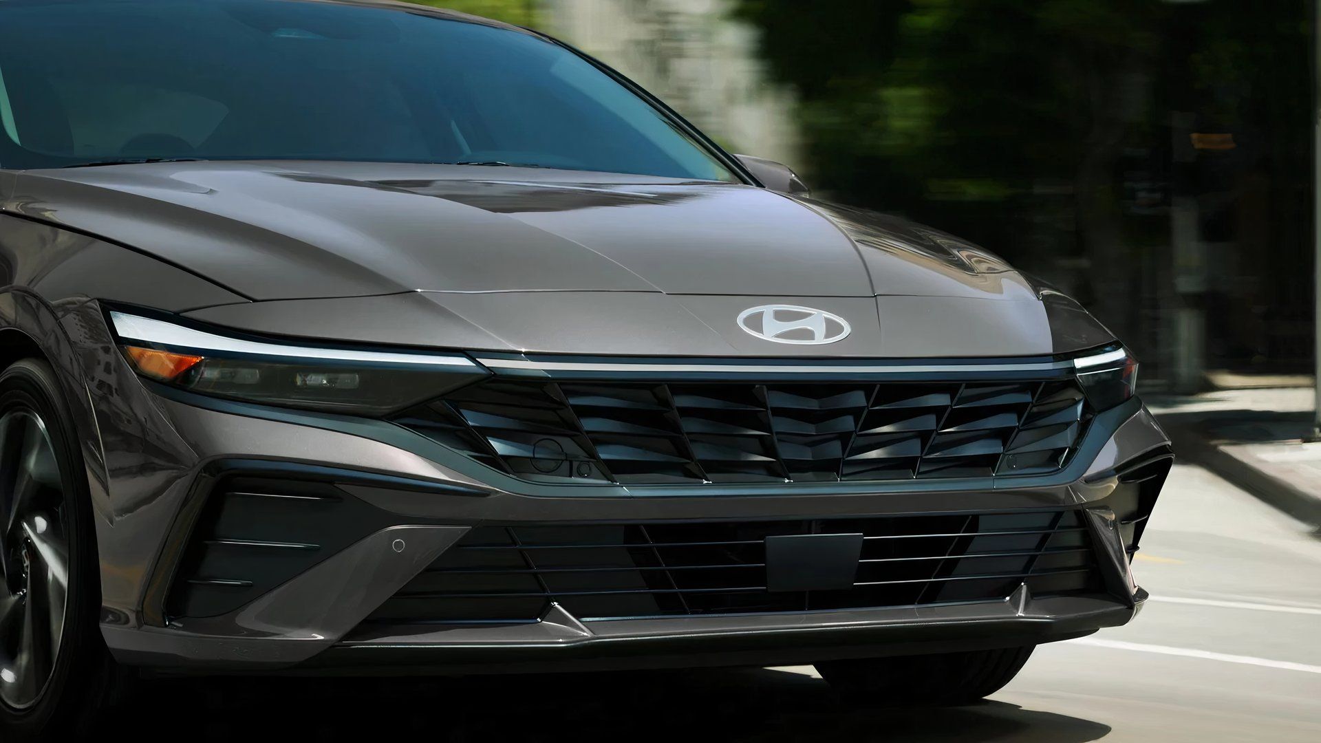 The front of a gray Hyundai Elantra Hybrid.