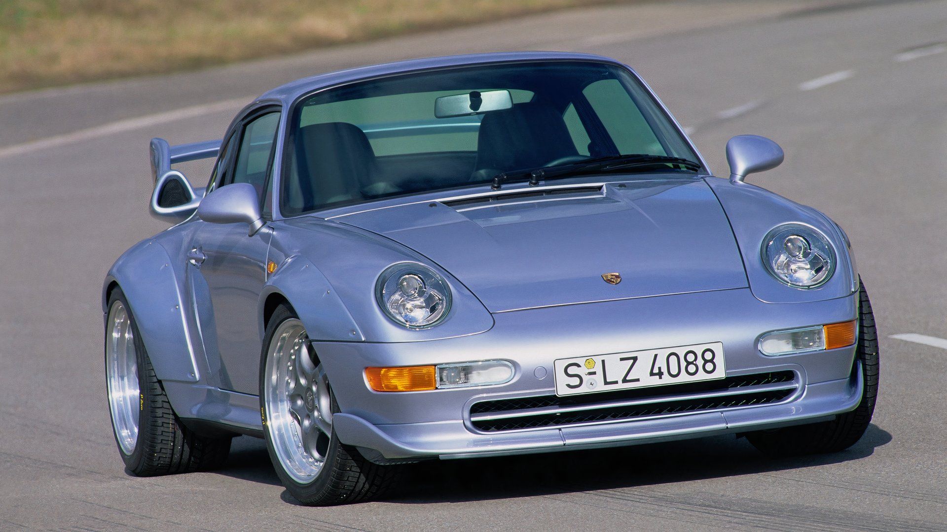 Porsche 993 911 GT2 driving on a track