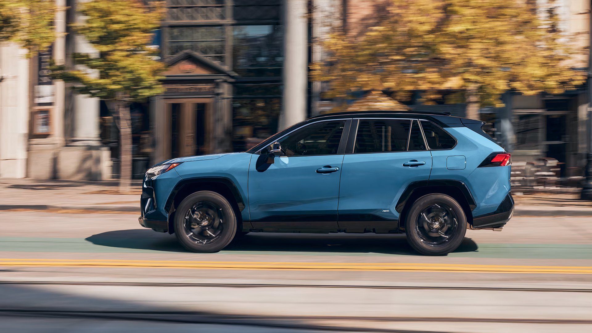 A blue Toyota RAV4 Hybrid small hybrid SUV. 