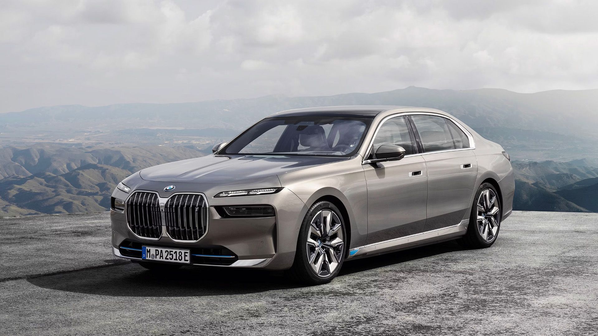 A 2023 BMW 7 Series parked high up in a hilly location