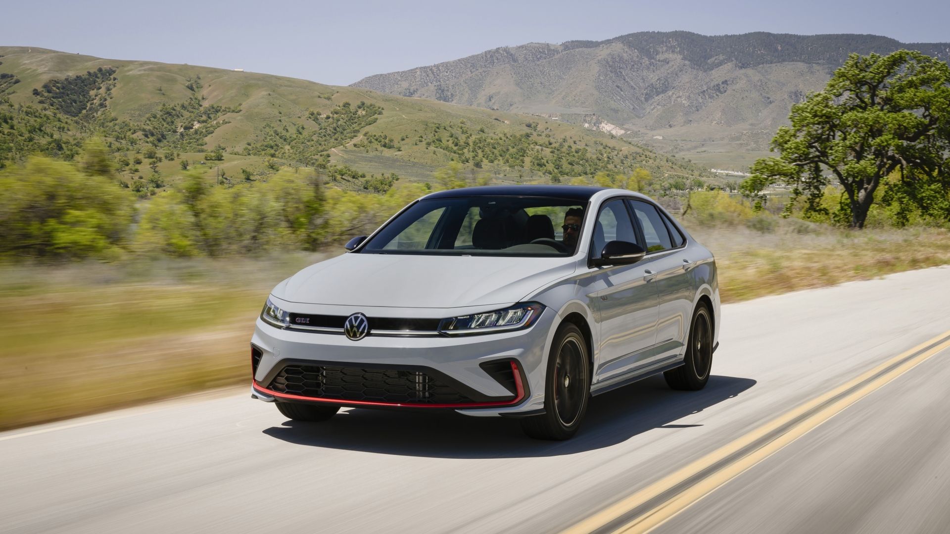 Front 3/4 action shot of a 2025 Volkswagen Jetta
