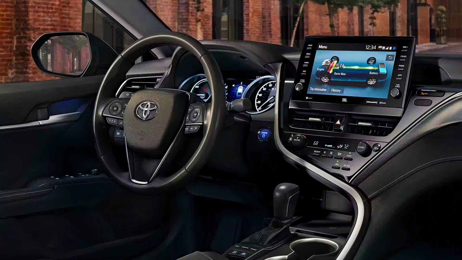 The interior of a Toyota Camry Hybrid.