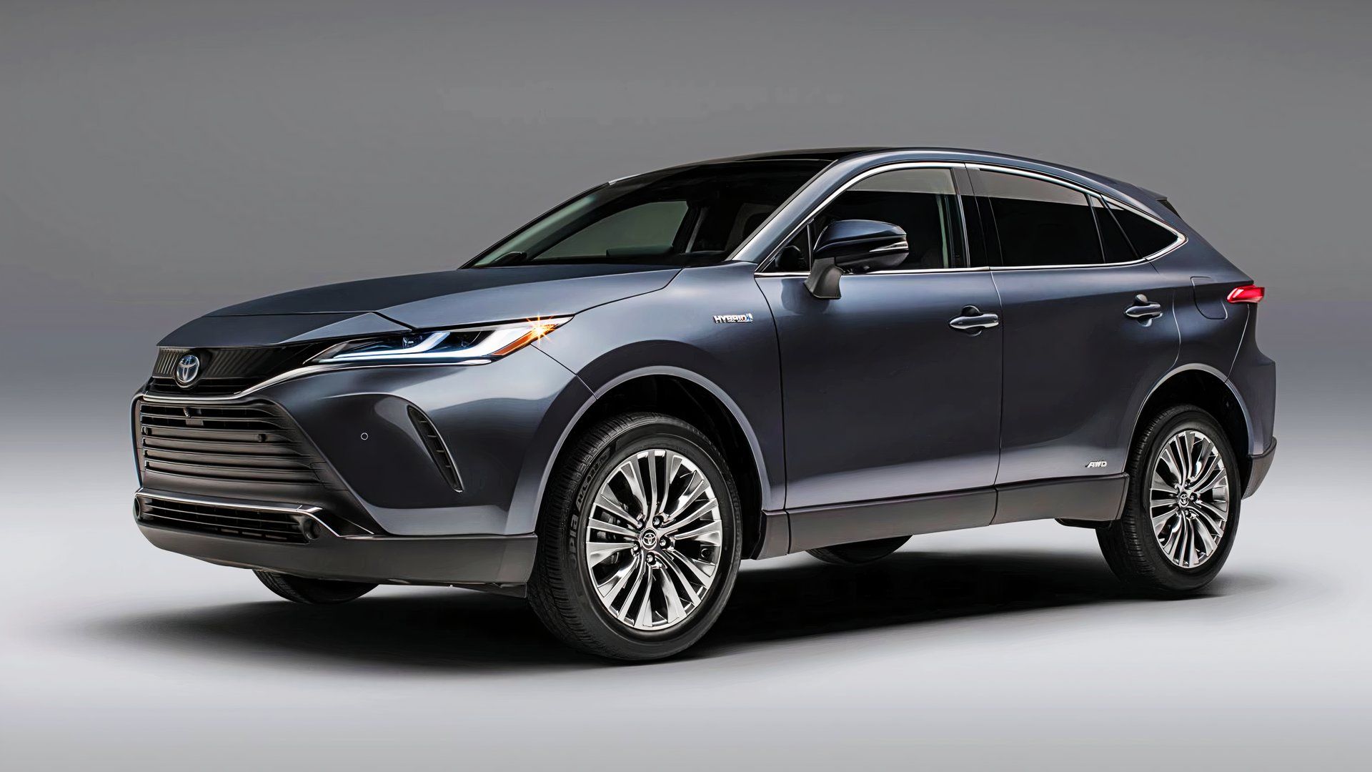 A blue 2021 Toyota Venza midsize hybrid SUV. 