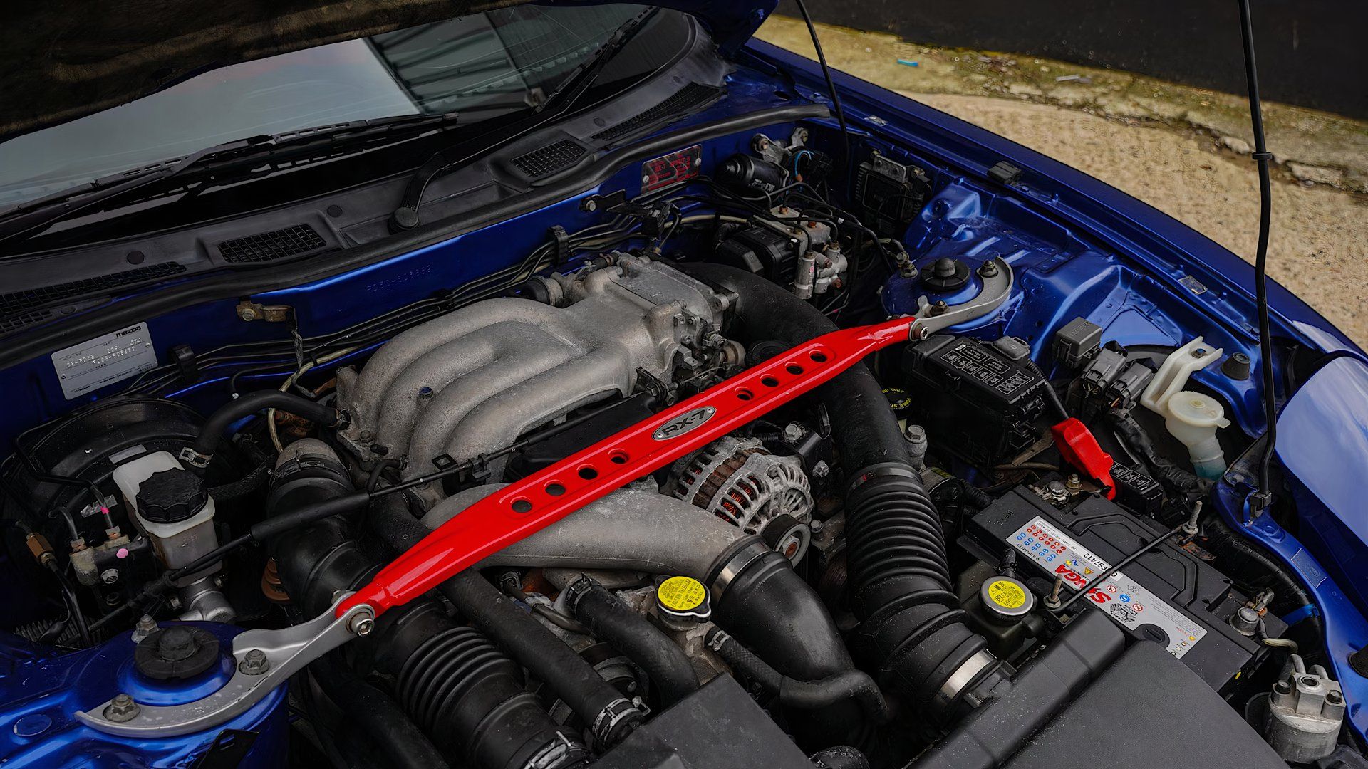 2002 Mazda RX-7 FD Spirit R engine bay showing 13B-REW Rotary engine