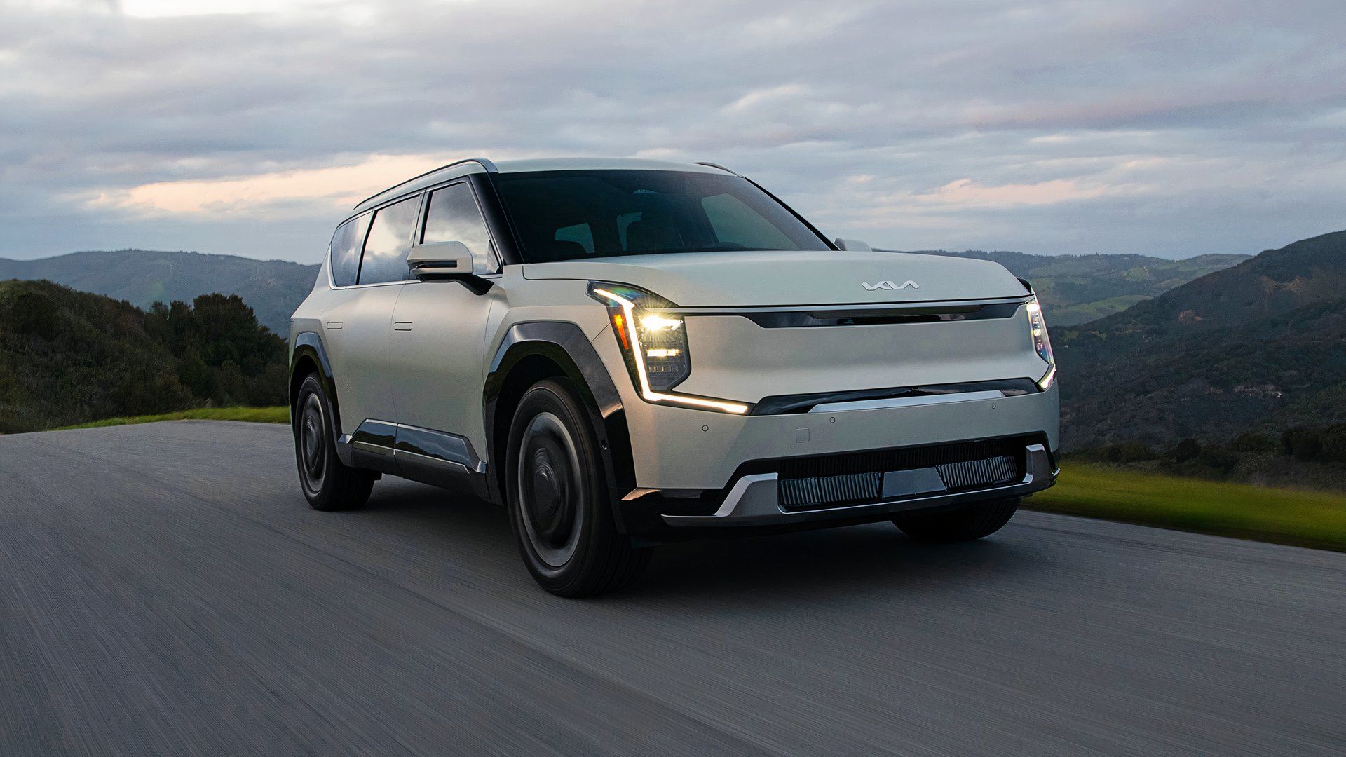 A white 2024 Kia EV9 midsize electric SUV. 
