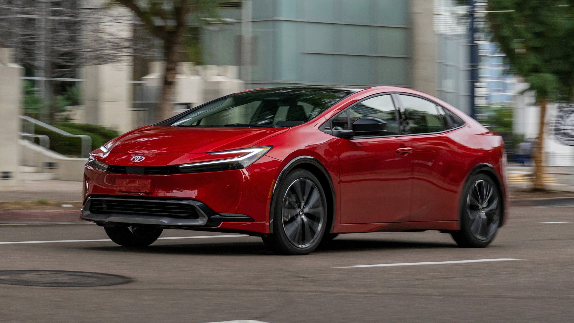 red 2024 Toyota Prius XLE, front 3/4