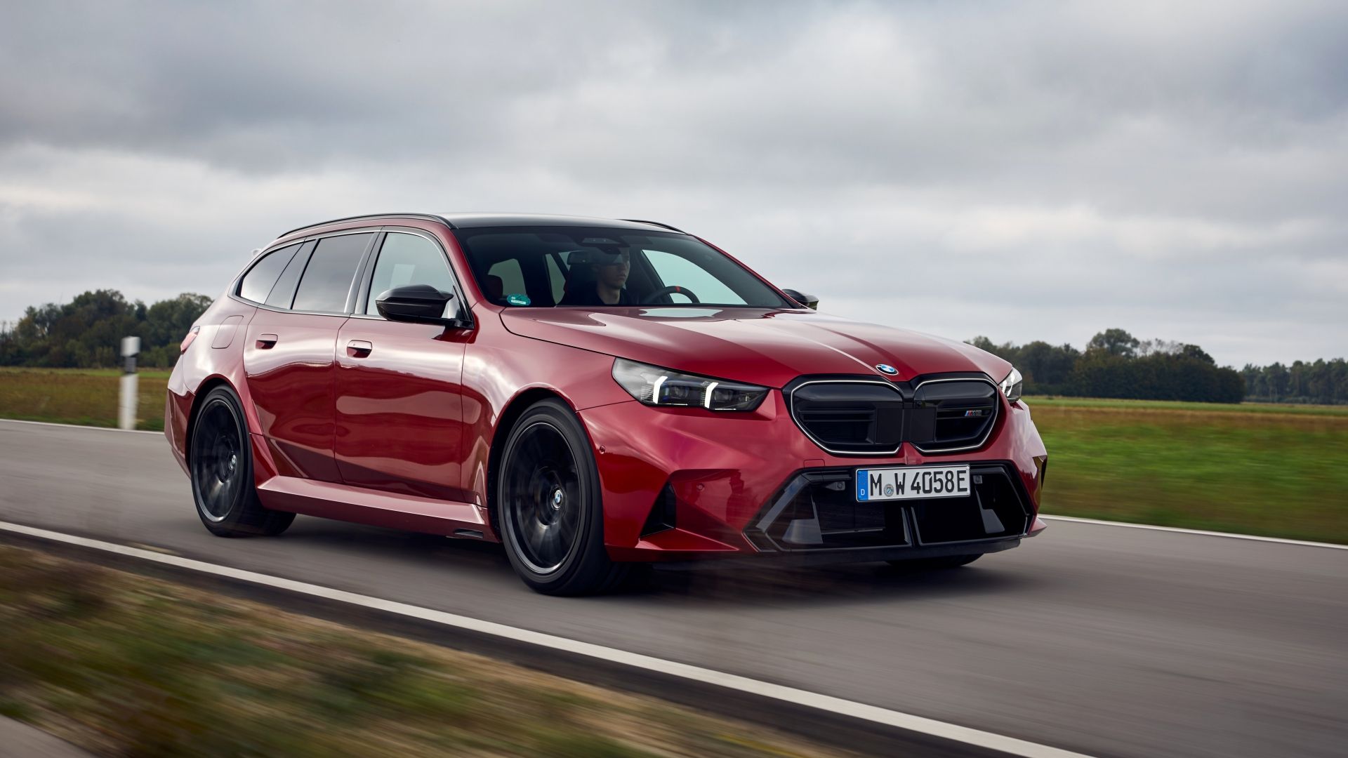 2025 BMW M5 Touring front 3/4 action shot