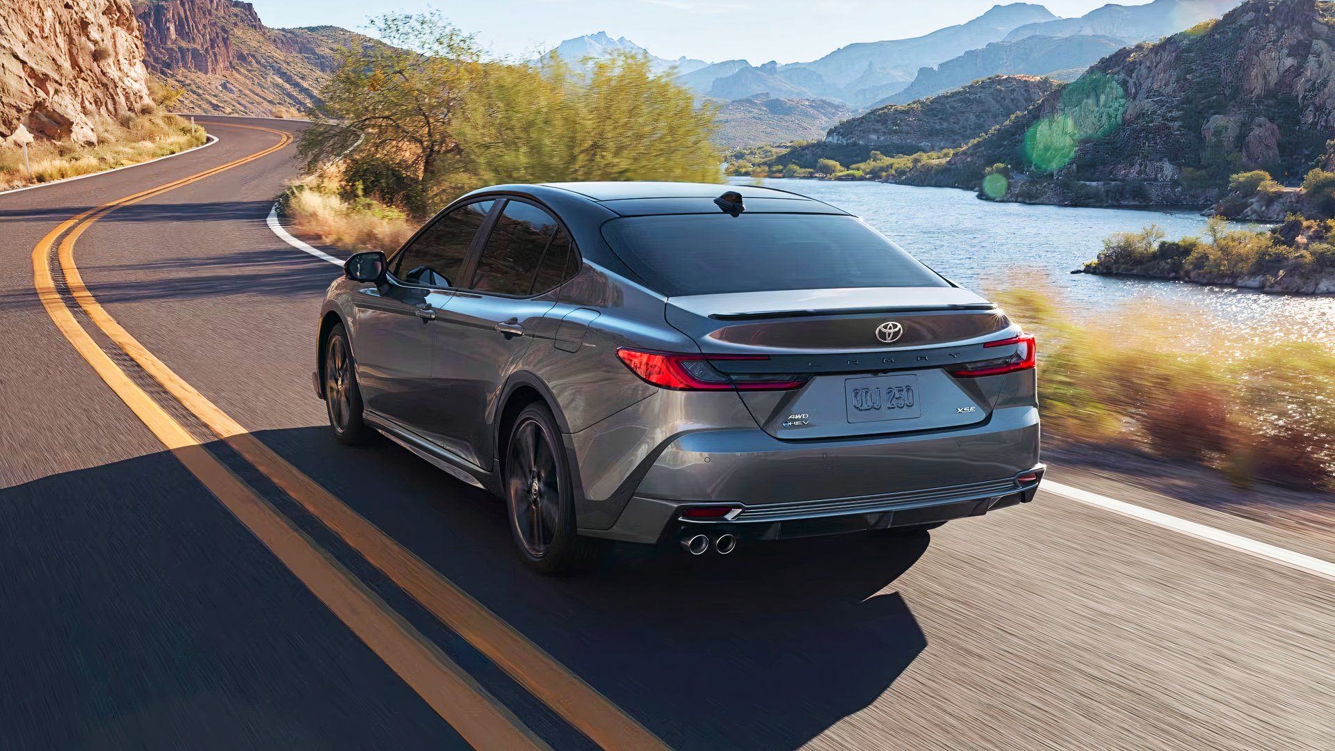 The rear of a gray 2025 Toyota Camry. 