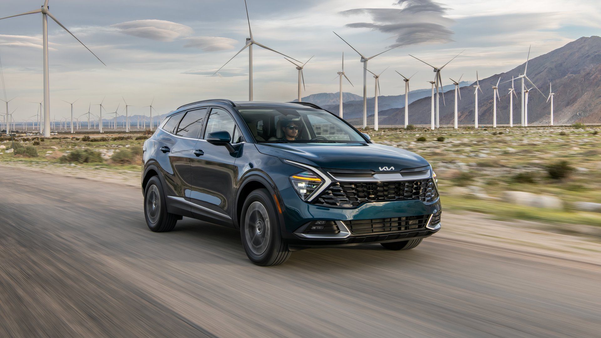 A front three-quarter view of a 2025 Kia Sportage Hybrid